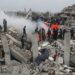 Rescue workers look for survivors in a building in Samada, Syria destroyed by the February 6 earthquake. (© UNOCHA/Ali Haj Suleiman )