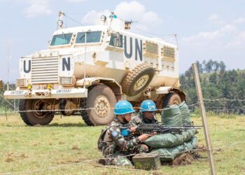 United Nations Organization Stabilization Mission in the Democratic Republic of the Congo (MONUSCO) Nepalese peacekeeping contingents assigned to the mobile detachment provide security for displaced people in the Lodha camp in Fataki. (Democratic Republic of the Congo)
