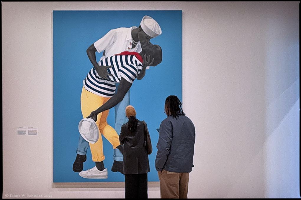 Visitors in front of For Love, and for Country by Amy Sherald, on display at the Whitney Museum as part of American Sublime. © Terry W. Sanders, 2025