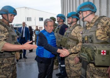 Secretary-General António Guterres (centre) meets with peacekeepers as he visits the headquarters of the United Nations Interim Force in Lebanon (UNIFIL) in Naqoura, Lebanon. (UN Photo/Pasqual Gorriz)