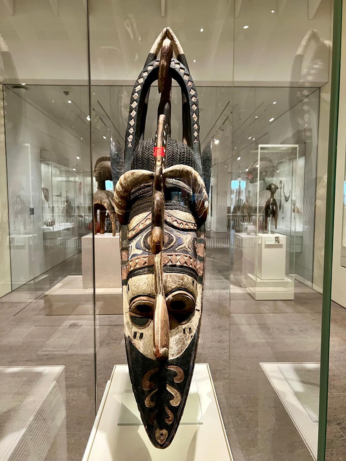 Mask from Papua New Guinea on display in the Oceania section of the Michael C. Rockefeller Wing at the Metropolitan Museum of Art.