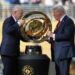 US President Donald Trump (R) and FIFA President Gianni Infantino (L) pick up the FIFA Clup World Cup 2025 trophy before presenting it to Chelsea FC after Chelsea FC defeated Paris Saint-Germain during the FIFA Club World Cup 2025 final match between Chelsea FC and Paris Saint-Germain, in East Rutherford, New Jersey, USA, 13 July 2025. ANSA/EPA/CJ GUNTHER