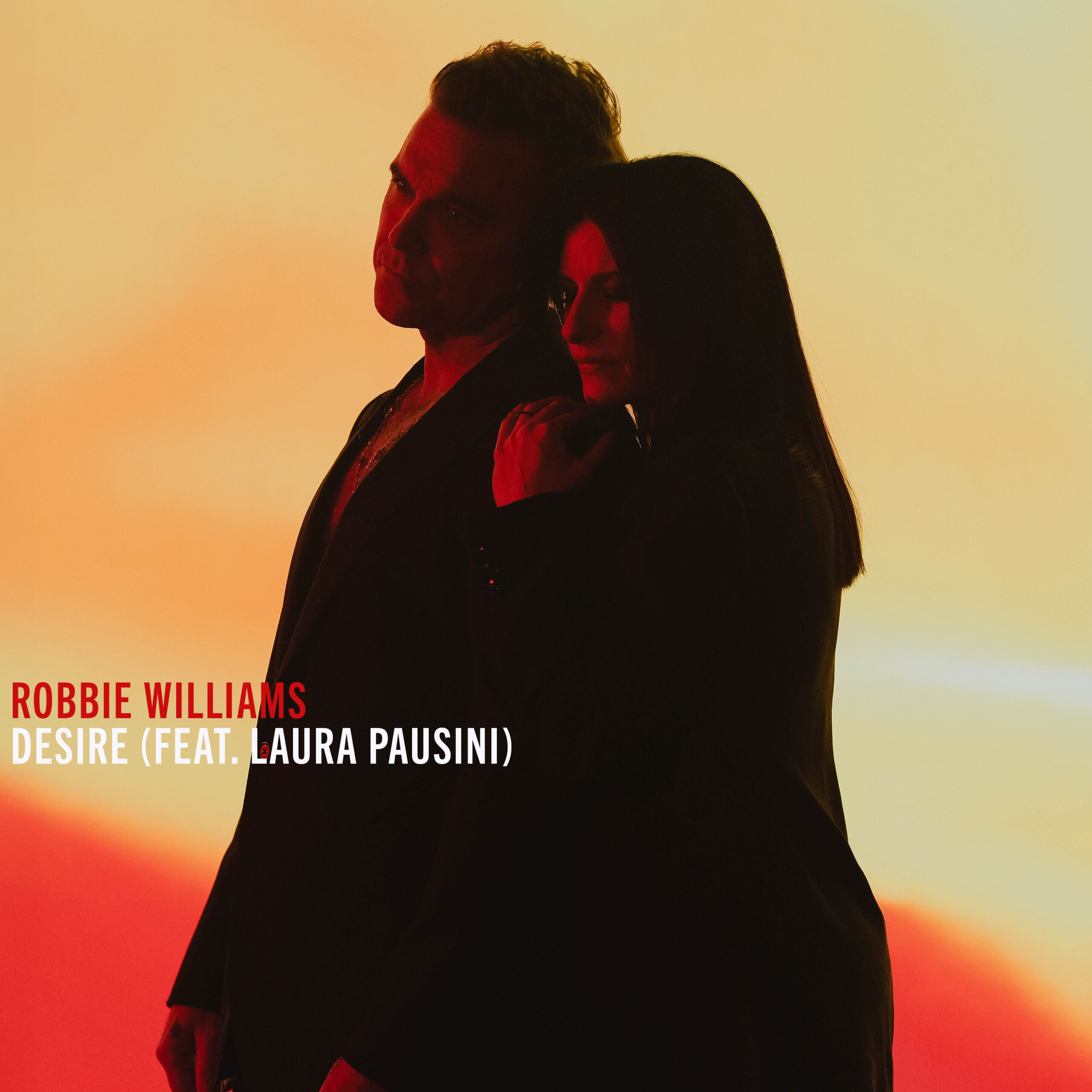 Robbie Williams e Laura Pausini in uno scatto promozionale per Desire, primo inno ufficiale FIFA.