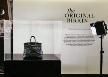 epa12210559 The original Birkin bag created by Hermes and owned by the English singer Jane Birkin on display during a Fashion Icons auction at Sotheby's press preview in Paris, France, 02 July 2025. The Fashion Icons exhibition, showcasing the original 1984 Hermes Birkin bag and iconic creations from the 1950s-2010s by designers like McQueen, Dior, Balmain, Gaultier, Galliano, and Alaia, is open for the public from 03 to 09 July 2025 at Sotheby's in Paris. The Fashion Icons auction will be held on 10 July 2025.  EPA/TERESA SUAREZ