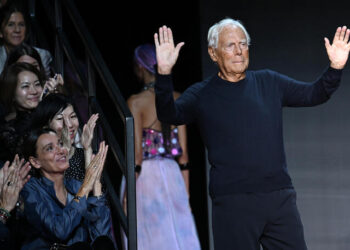 Italian fashion designer Giorgio Armani greets the audience with model wearing creations part of the Emporio Armani women's Spring Summer 2024 collection during the Fashion Week in Milan, Italy, 21 September 2023. The Milan Fashion Week Spring/Summer 2024 runs from 19 to 25 September 2023